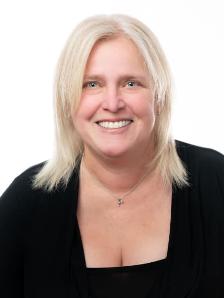 Portrait photo of a smiling blonde woman