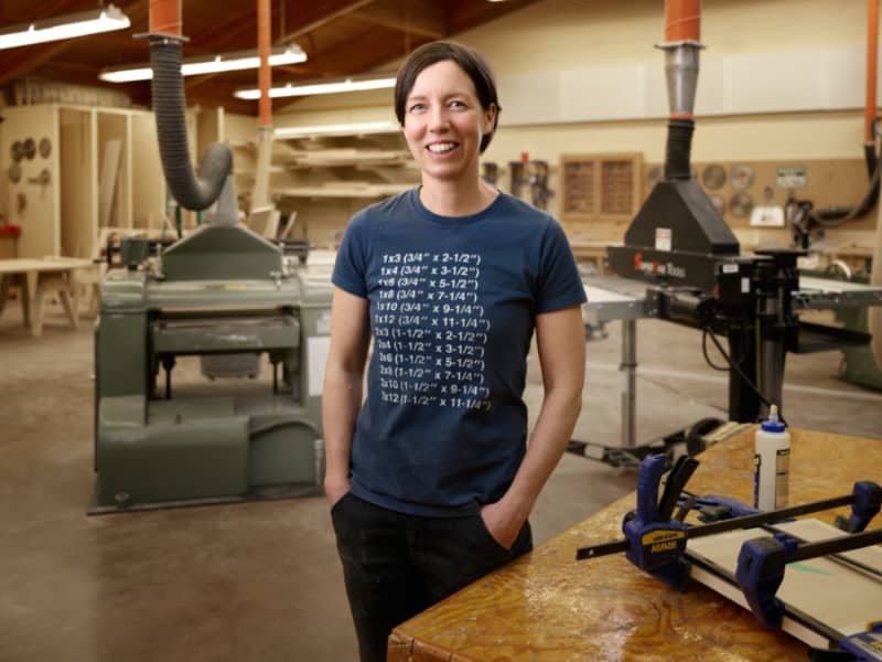 Meagan Christie posing in the carpentry shop