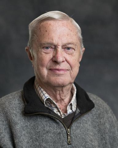 Portrait of Rolf Hougen, an elderly man wearing a button-up short