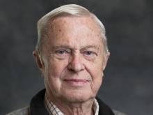 Portrait of Rolf Hougen, an elderly man wearing a button-up short